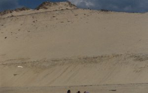 Dune with person walking on top